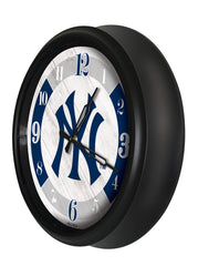 MLB's New York Yankees Logo Indoor/Outdoor Logo LED Clock from Holland Bar Stool Co Home Sports Decor for gifts Side View